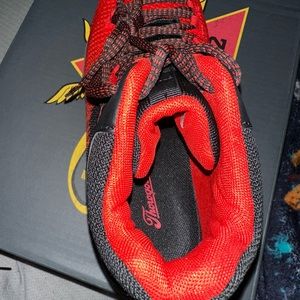 Thorogood black and red men’s 11 1/2 wide work shoes.